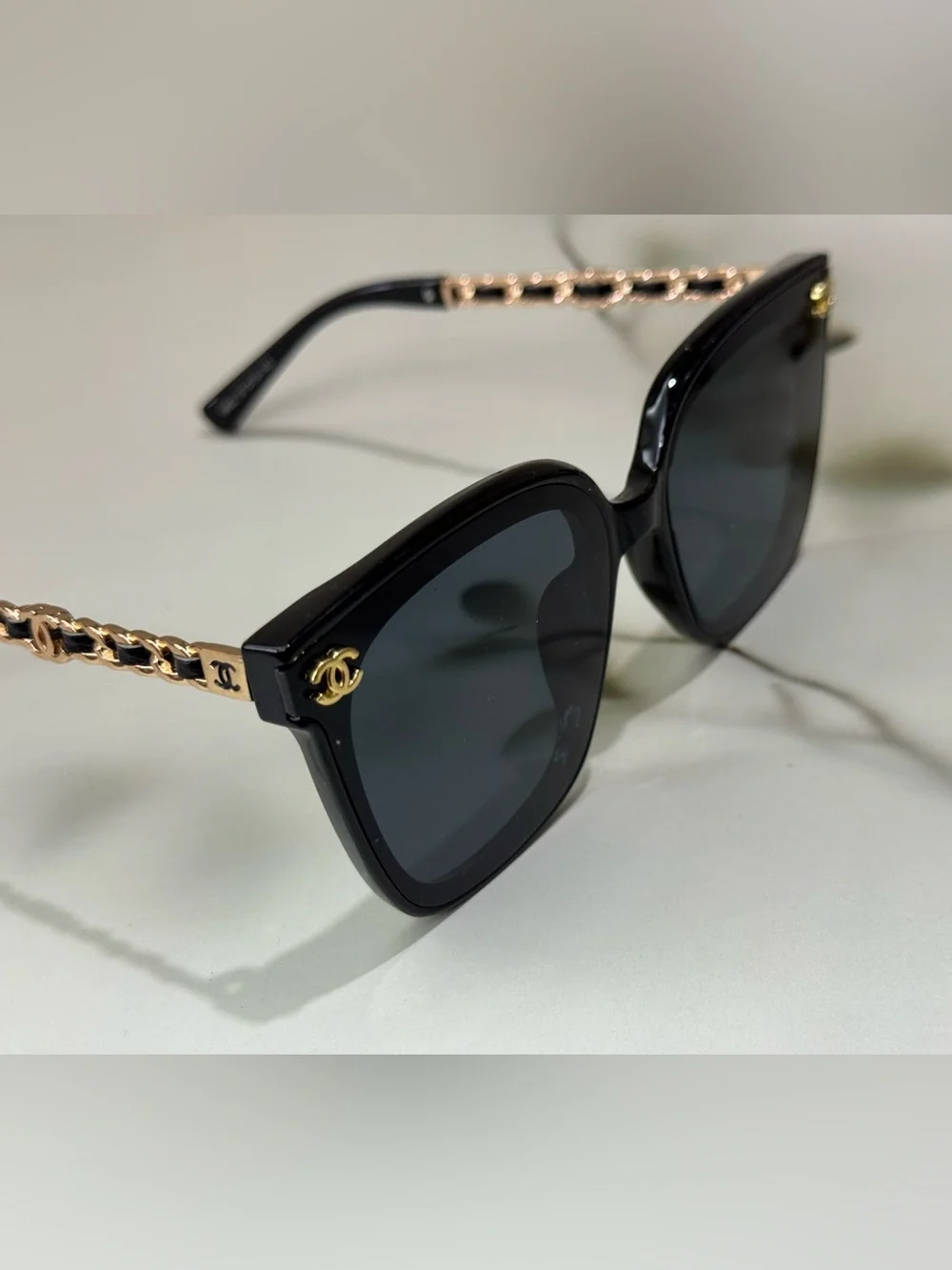 Chanel Black Cat-Eye Sunglasses with Gold CC Accents